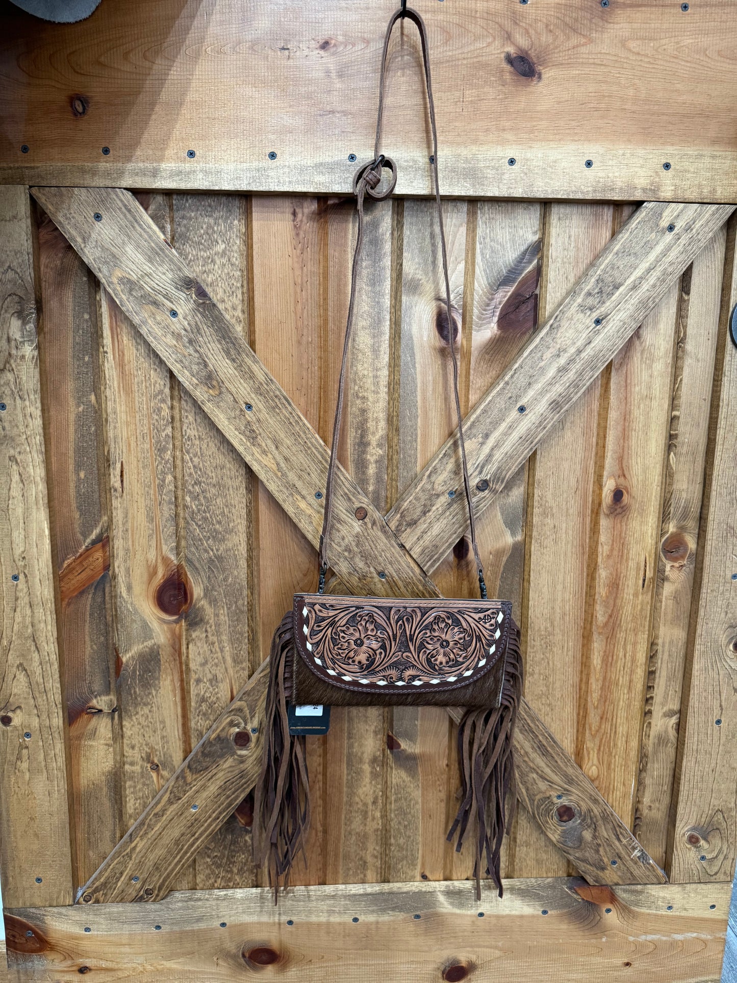 Tooled Genuine Leather Crossbody with Fringe and Cowhide