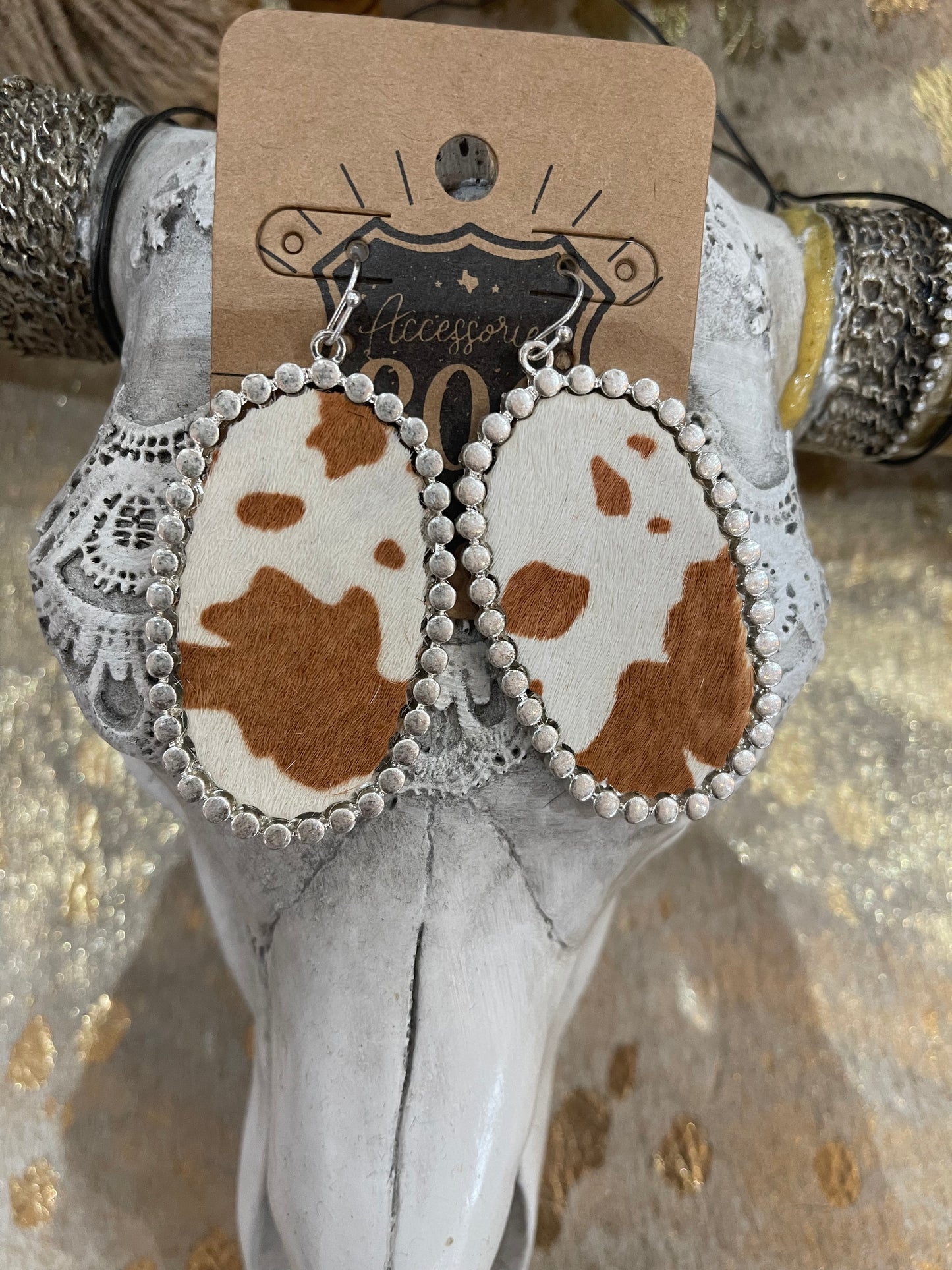 White and brown cowhide earrings