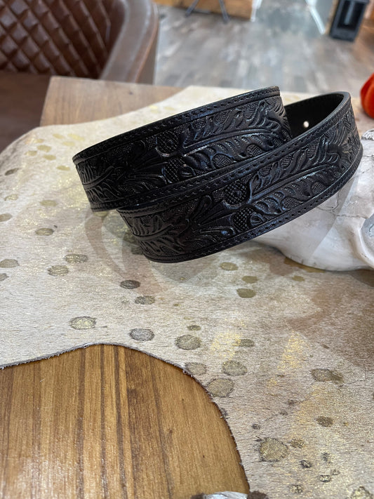 Black tooled leather belt without buckle