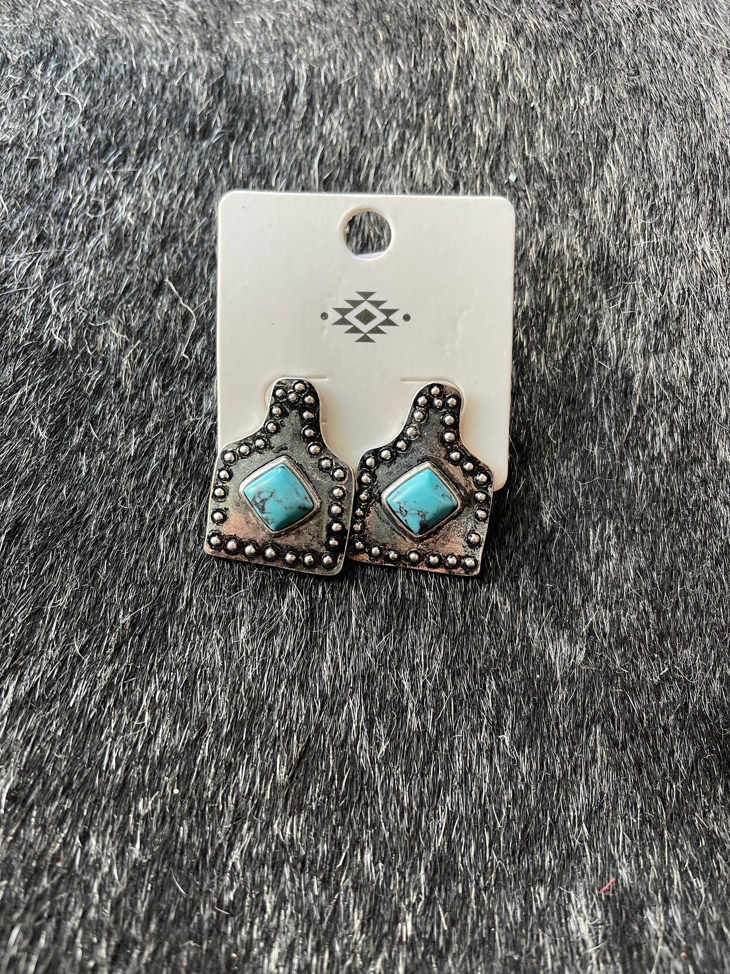 Ear tag earrings